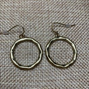 Brushed gold hoops with slight hammer finish.